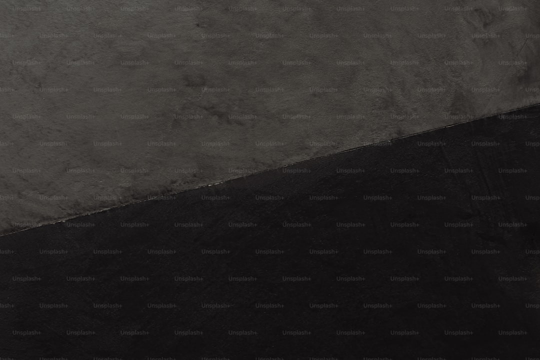 a black and white photo of a person on a skateboard