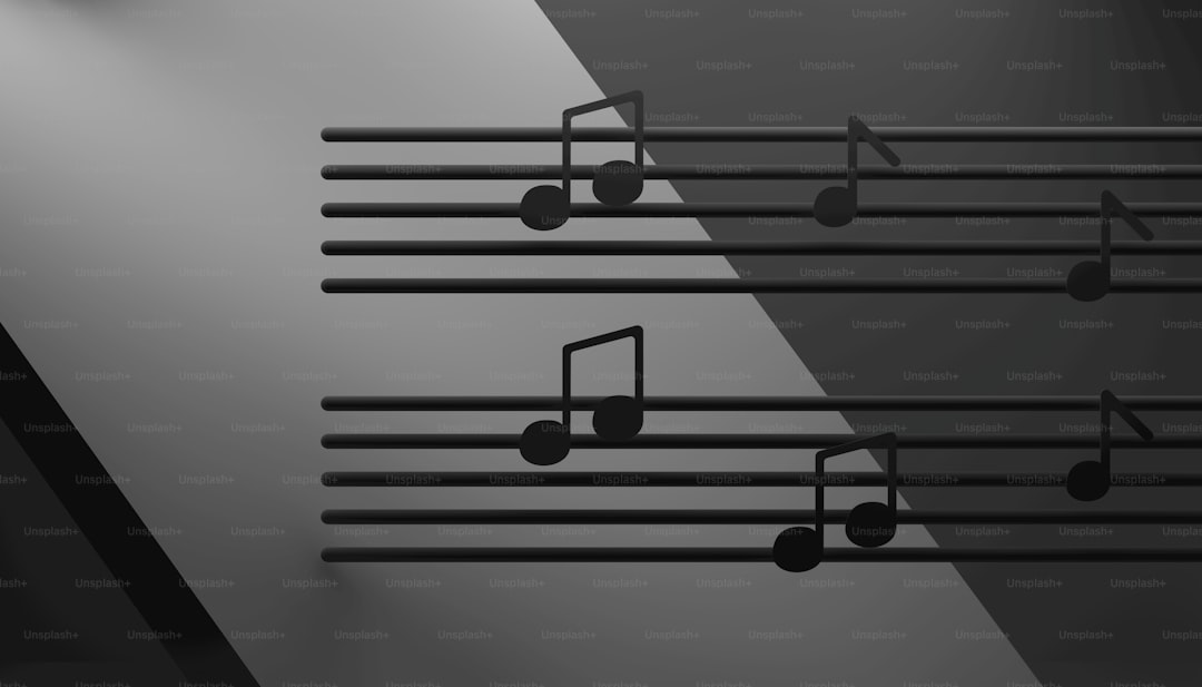 a black and white photo of musical notes