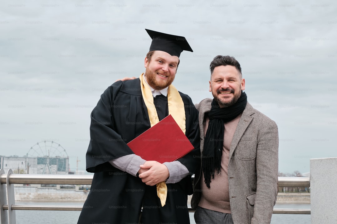 a couple of men standing next to each other