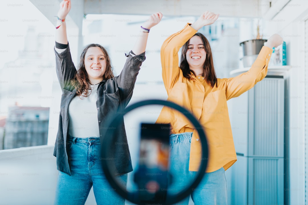 a couple of women posing for the camera