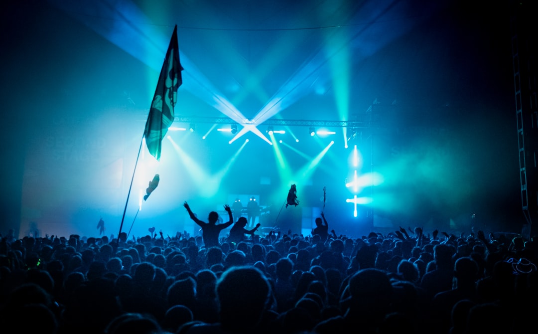 A crowd of people standing on top of a stage