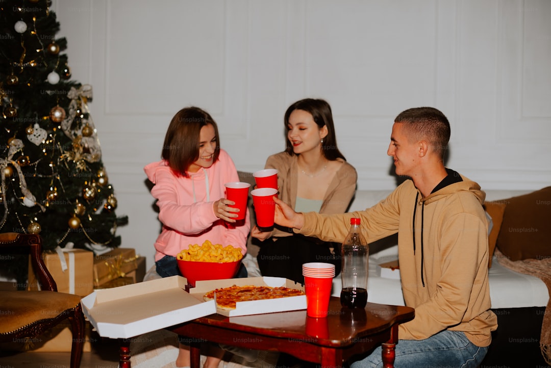 a group of people sitting around a table