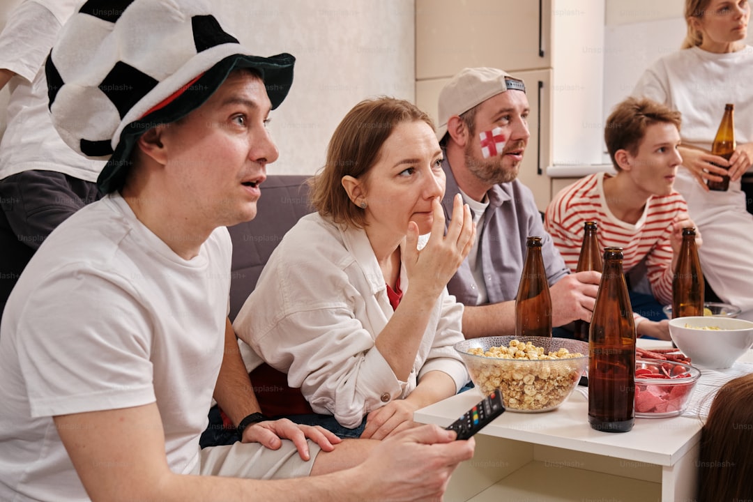 a group of people sitting around a table eating food