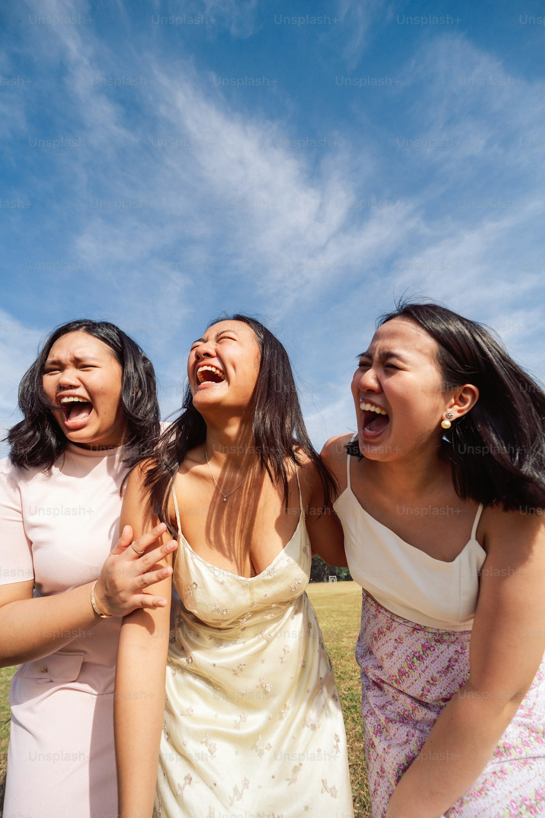 a group of women standing next to each other