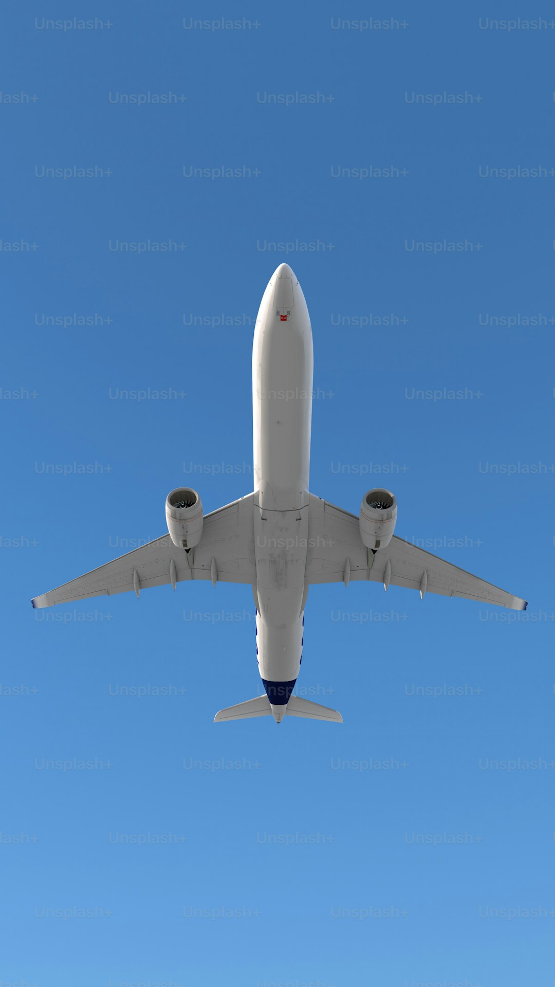 a large jetliner flying through a blue sky