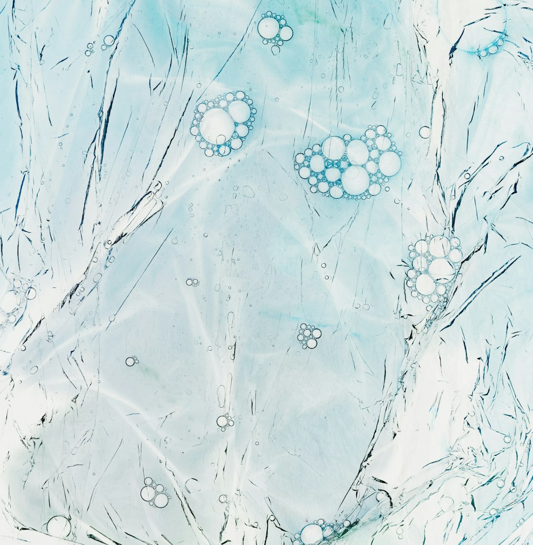 a painting of water and bubbles on a blue background