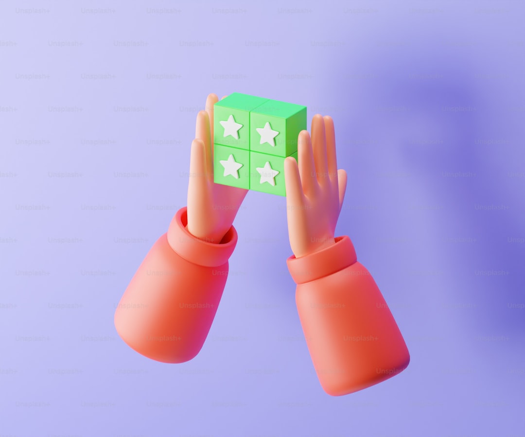 A pair of hands holding a green cube