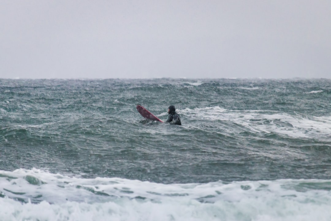 a person on a surfboard in the ocean