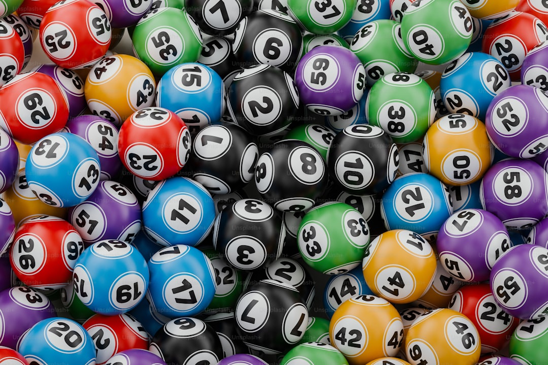 a pile of colorful pool balls with numbers on them