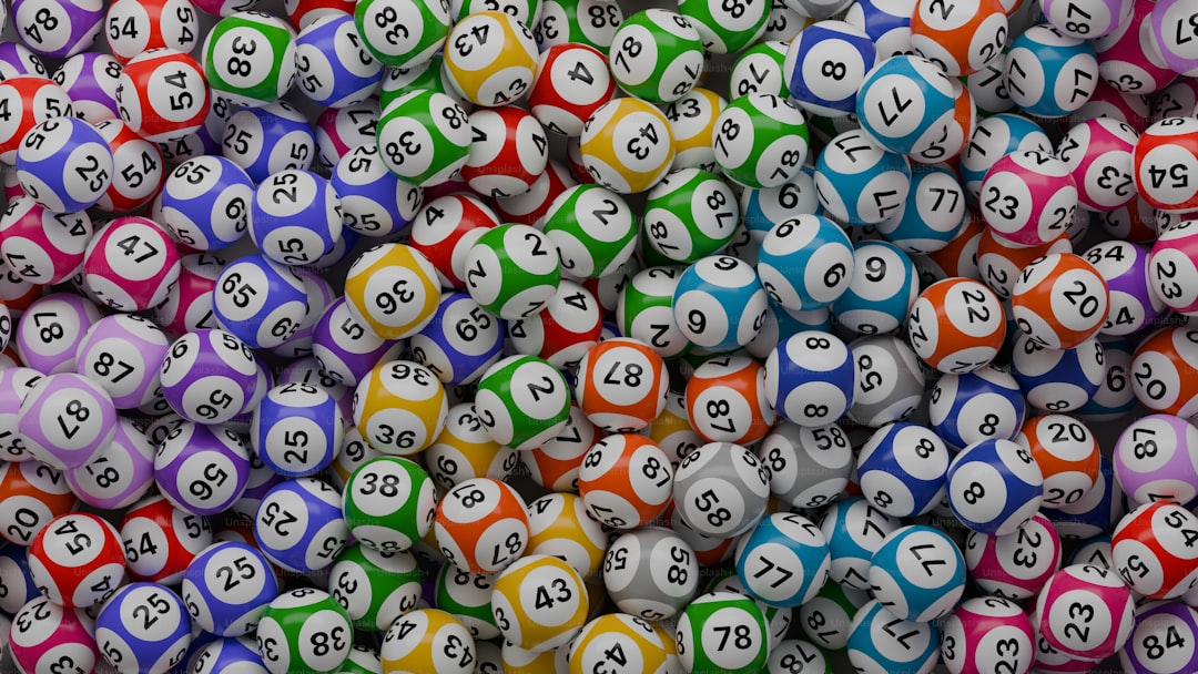 a pile of colorful pool balls with numbers on them