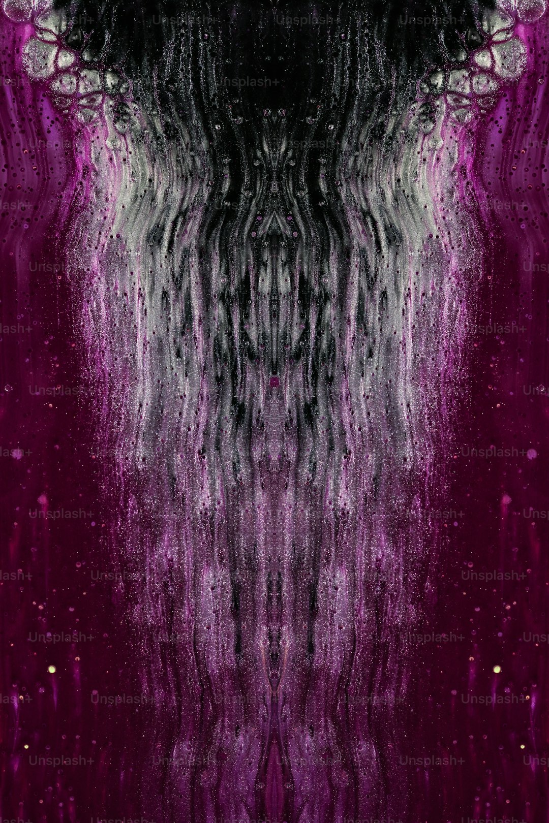 a purple and black background with a pattern