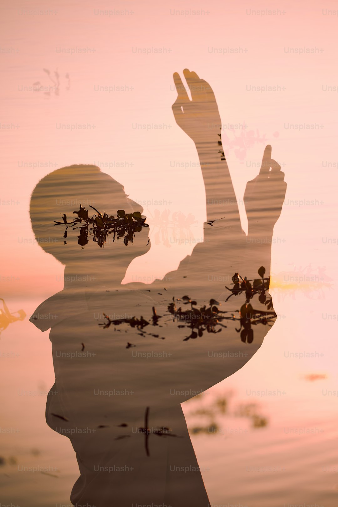 a reflection of a person in the water