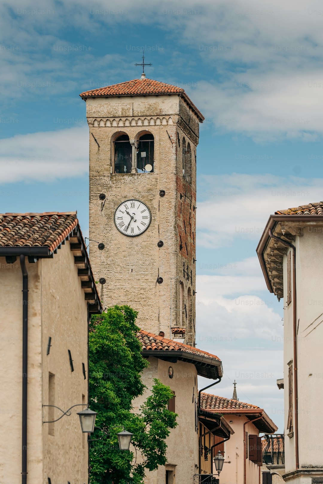 a tall tower with a clock on the top of it