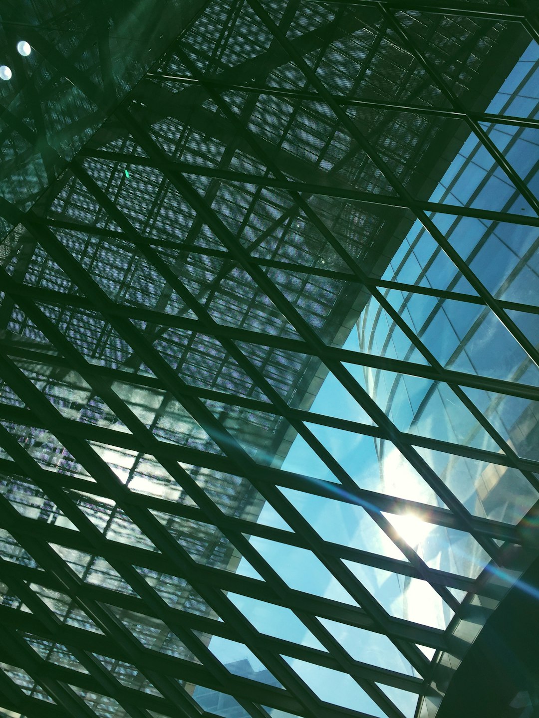 a view of a very tall building from below