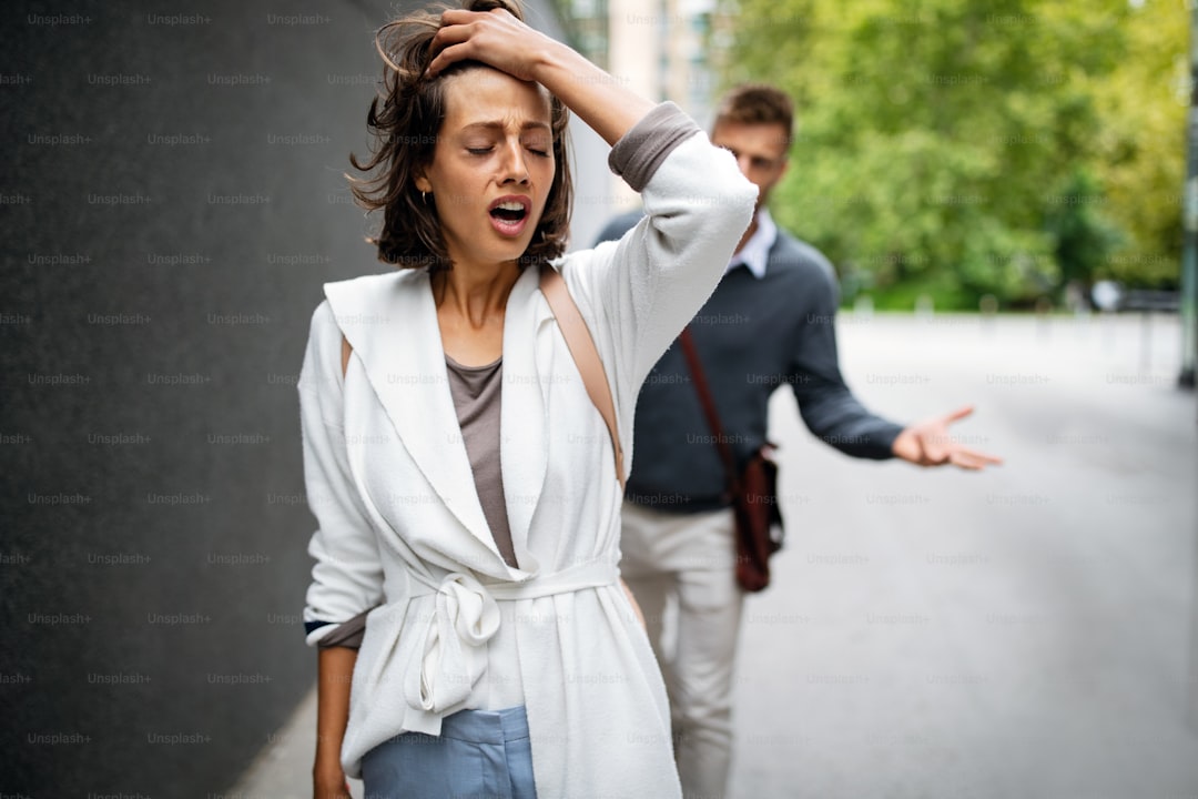 Frustrated couple arguing and having marriage problems outdoor