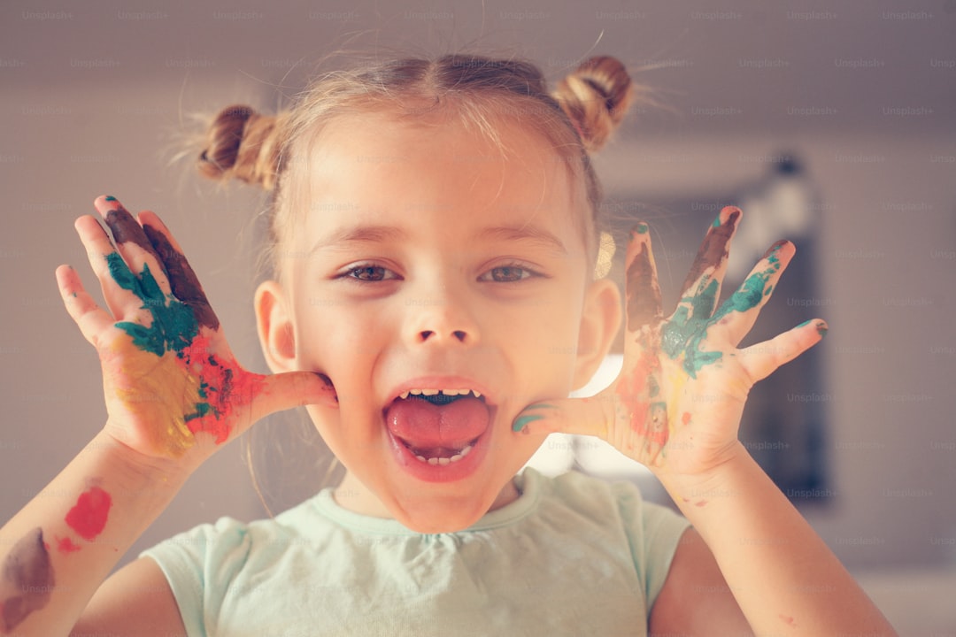 Hands covered in tempura paint.