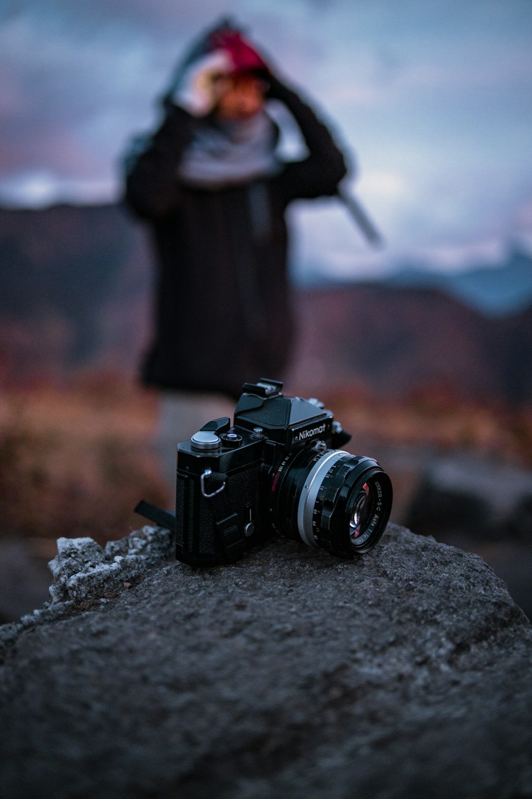 selective focus photography of black a silver DSLR camera