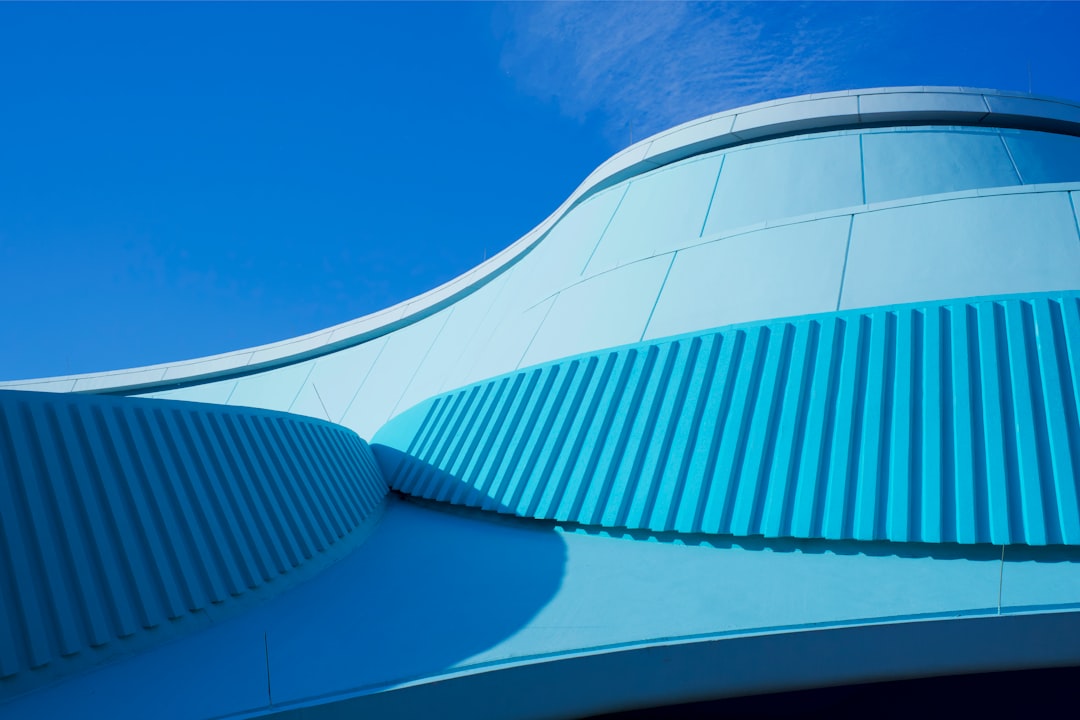 white concrete building under blue sky during daytime